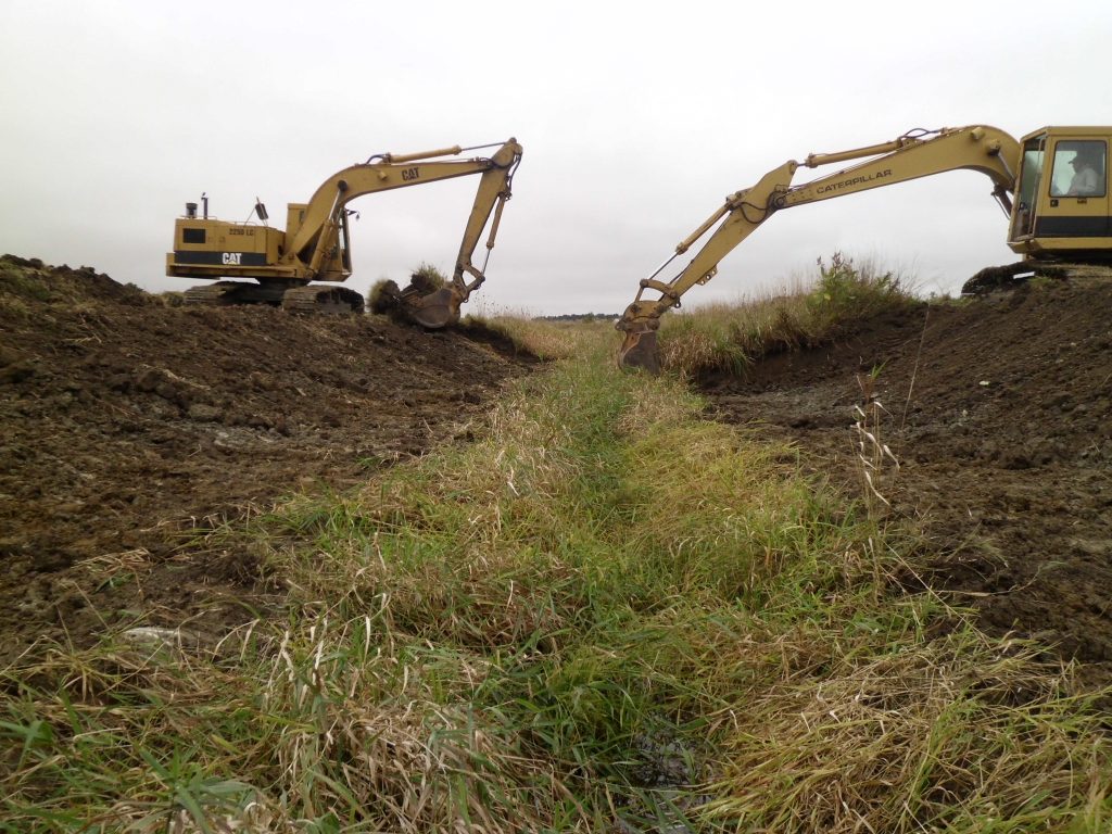 tractors digging earth